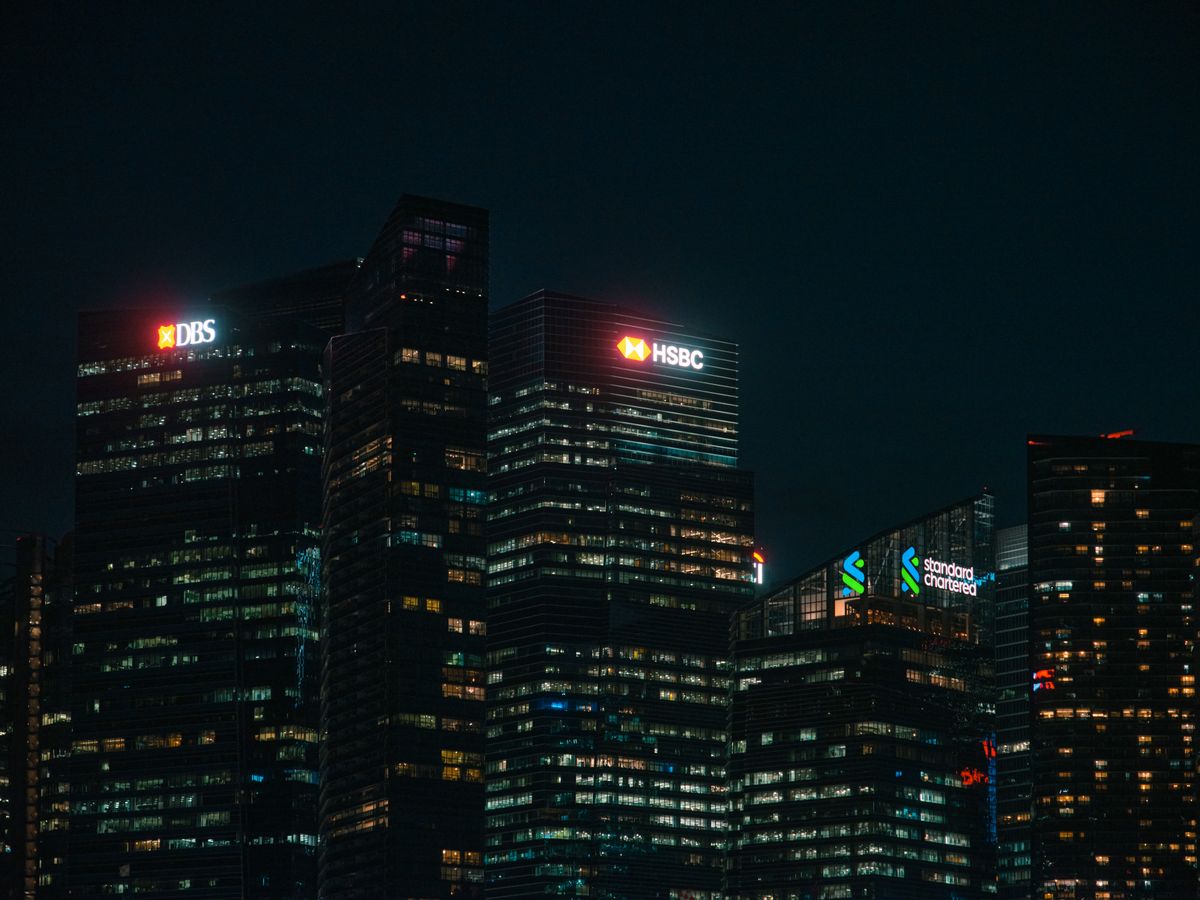 Night view of illuminated bank skyscrapers in a financial district