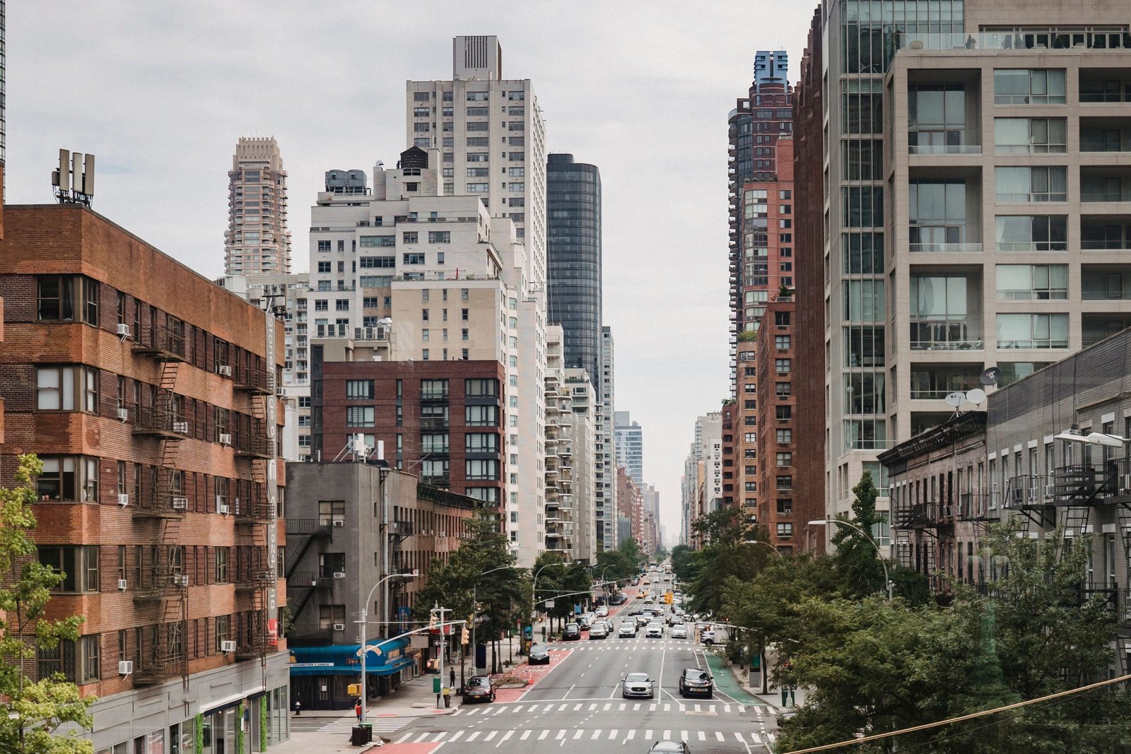 Modern glass skyscrapers in a city business district representing private enterprise and capitalism