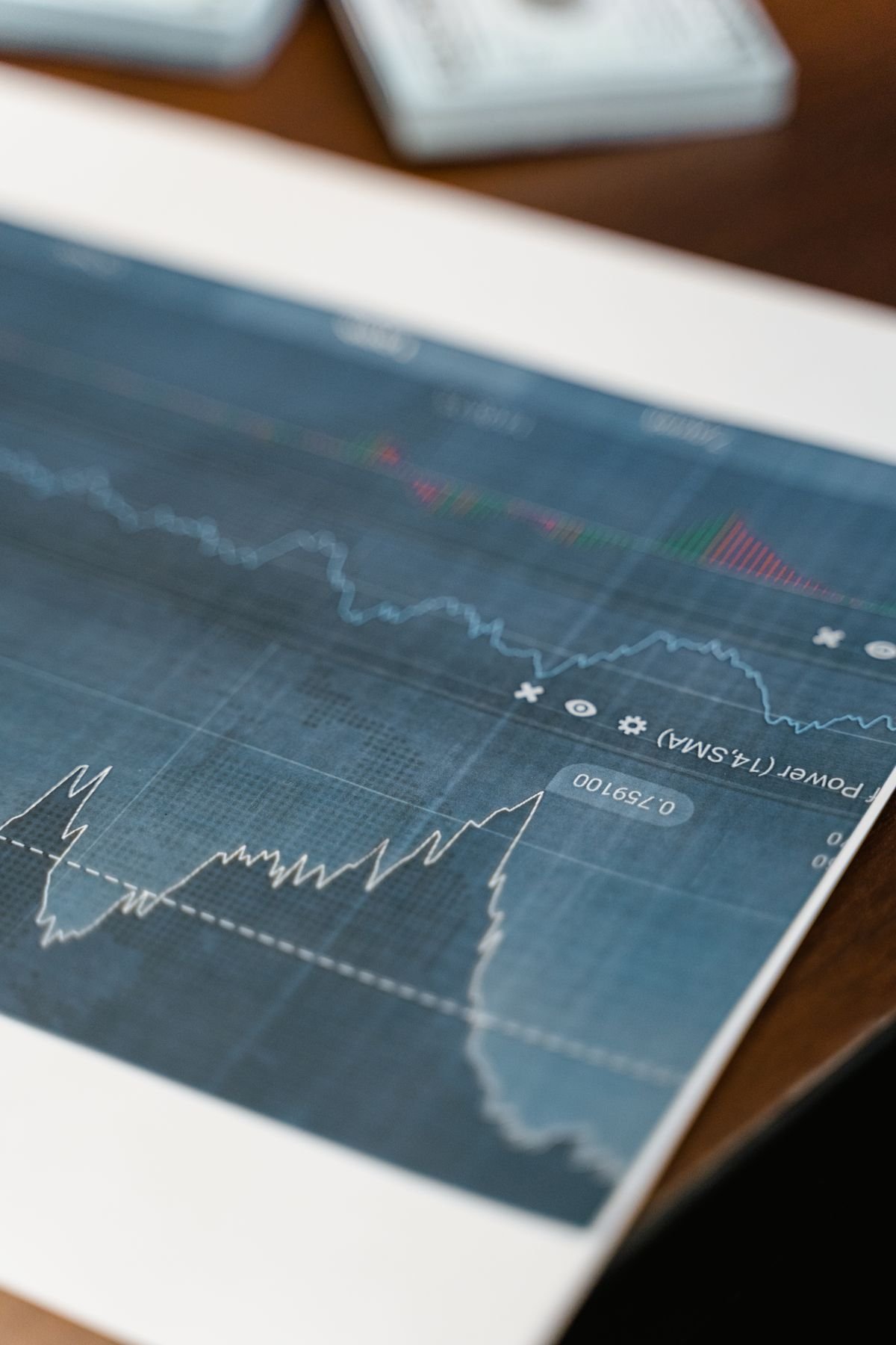 Close-up of a printed financial report showing growth figures and charts