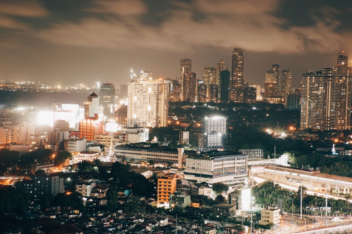 Mumbai cityscape illuminated at night, representing India fast-growing emerging economy