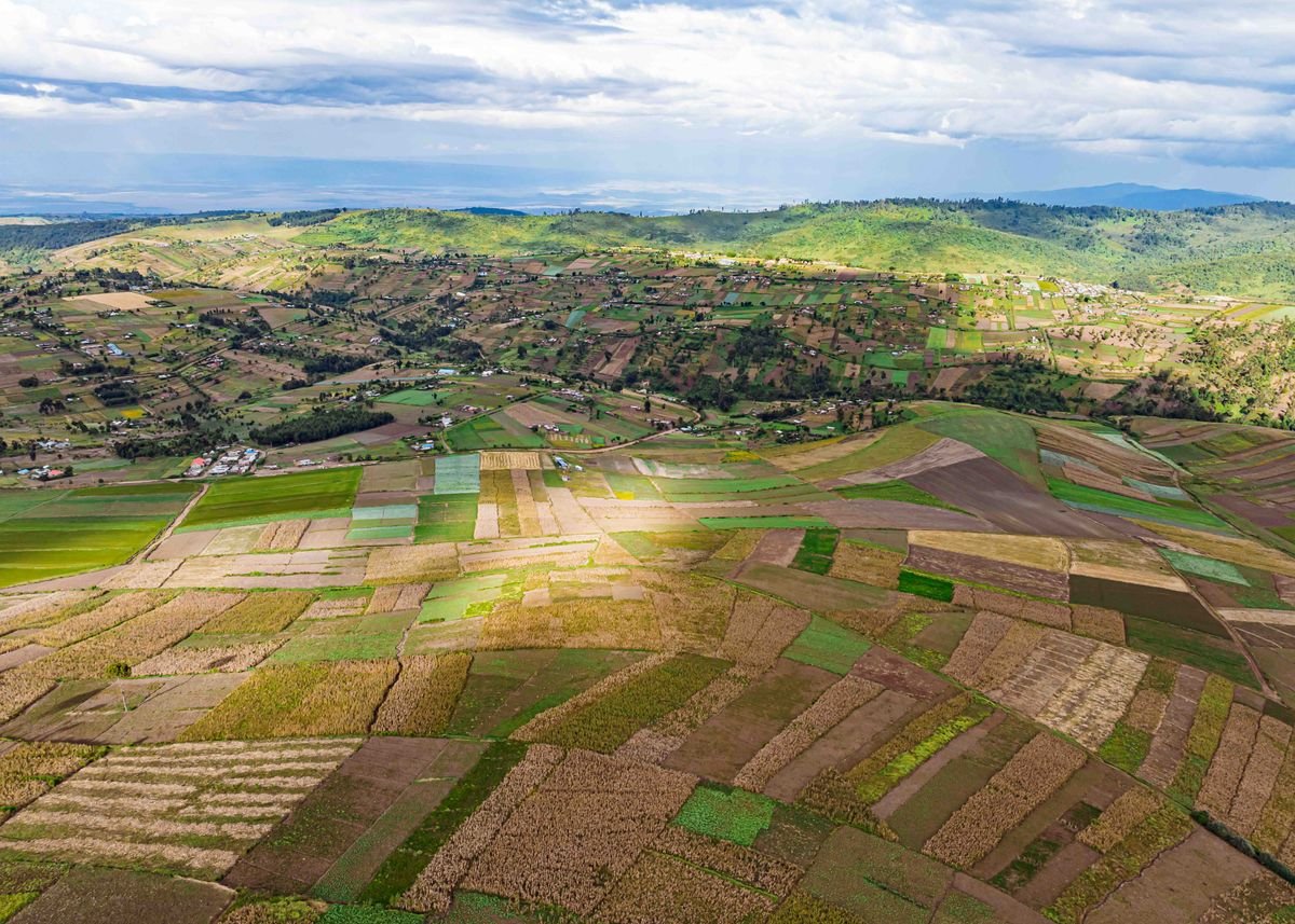 Aerial view of patchwork smallholder farms in a rural highland area